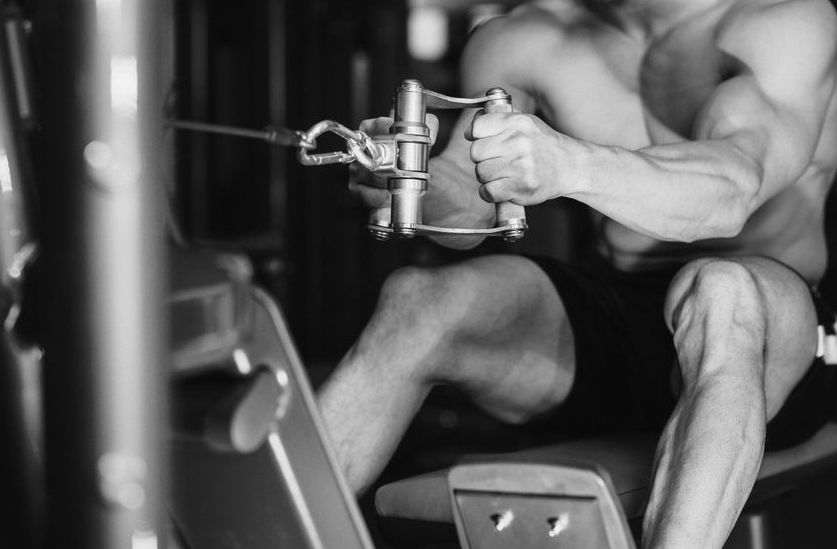 Man doing Rows on Weight Machine